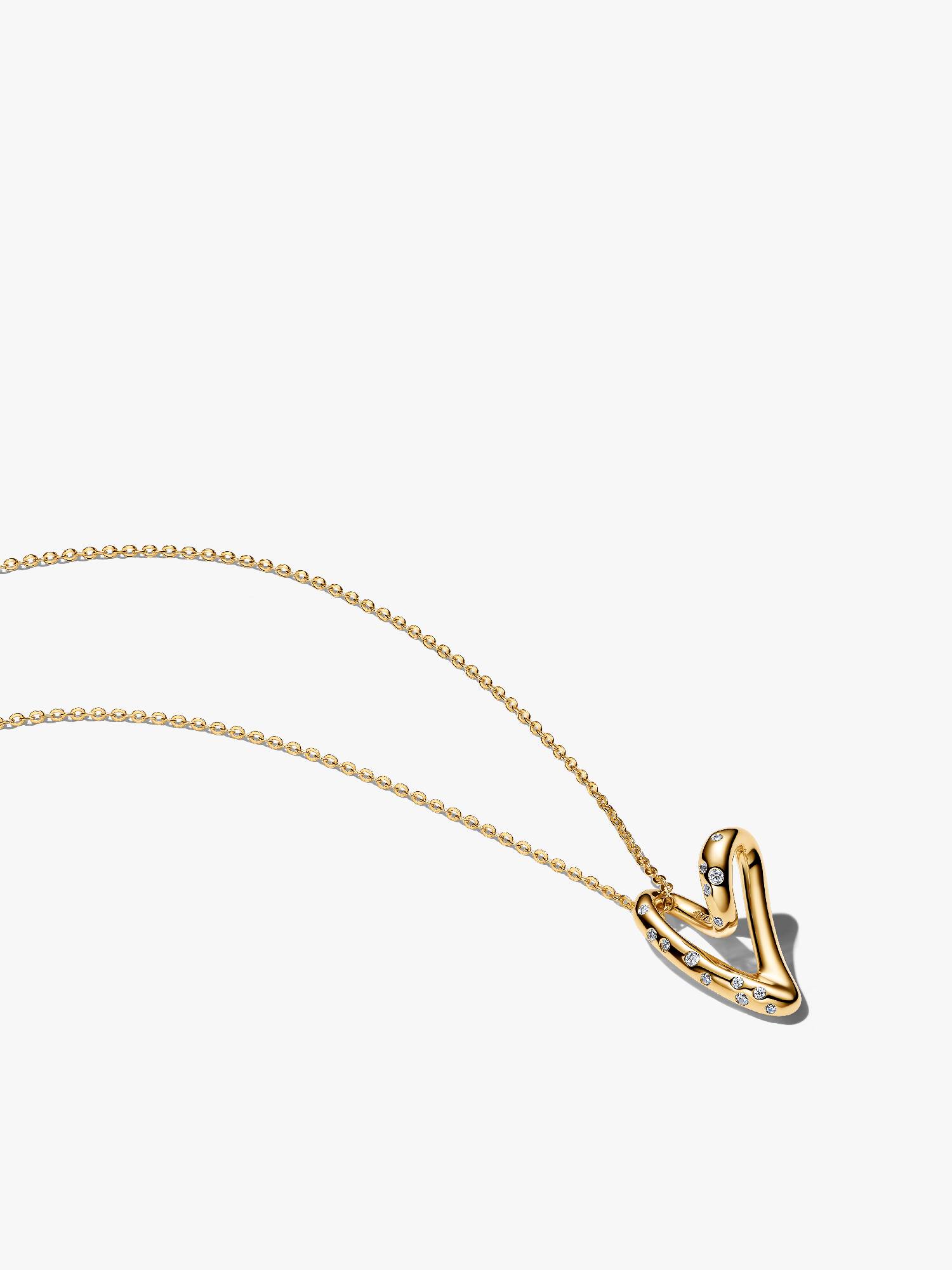 Collar con colgante corazón de forma orgánica engastado con piedras 