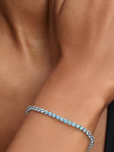 Brazalete de tenis azul claro reluciente