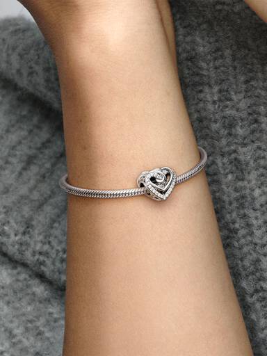 Charm Corazones entrelazados resplandecientes