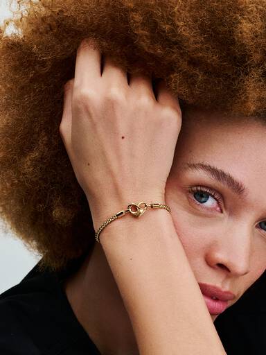 Brazalete cadena de serpiente con botones
