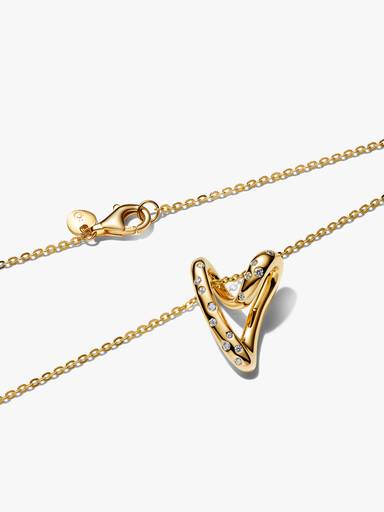 Collar con colgante corazón de forma orgánica engastado con piedras