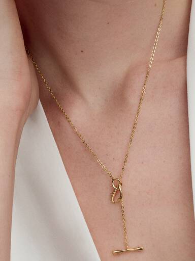 Collar de círculos de forma orgánica con barra en T