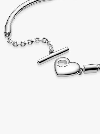 Brazalete con cadena tipo serpiente y barra en forma de corazón