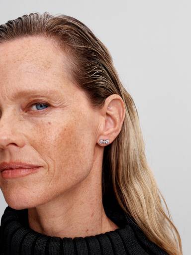 Aretes de botón Moño reluciente